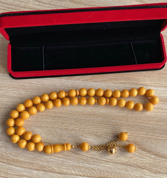 قطعة واحدة سبحة كهرب  ألماني  كبس، حجر كهرب خام طبيعي ١٠٠ بال ١٠٠ من دون اية مواد مضافه() - الذهب اللي بالسبحة خام عيار 21