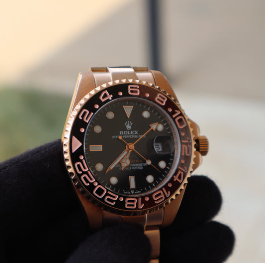 (السعر بالدينار الأردني 300 دينار)Rolex GMT Master RootBeer  رولكس روت بير جراند ماستر اوتوماتيك
