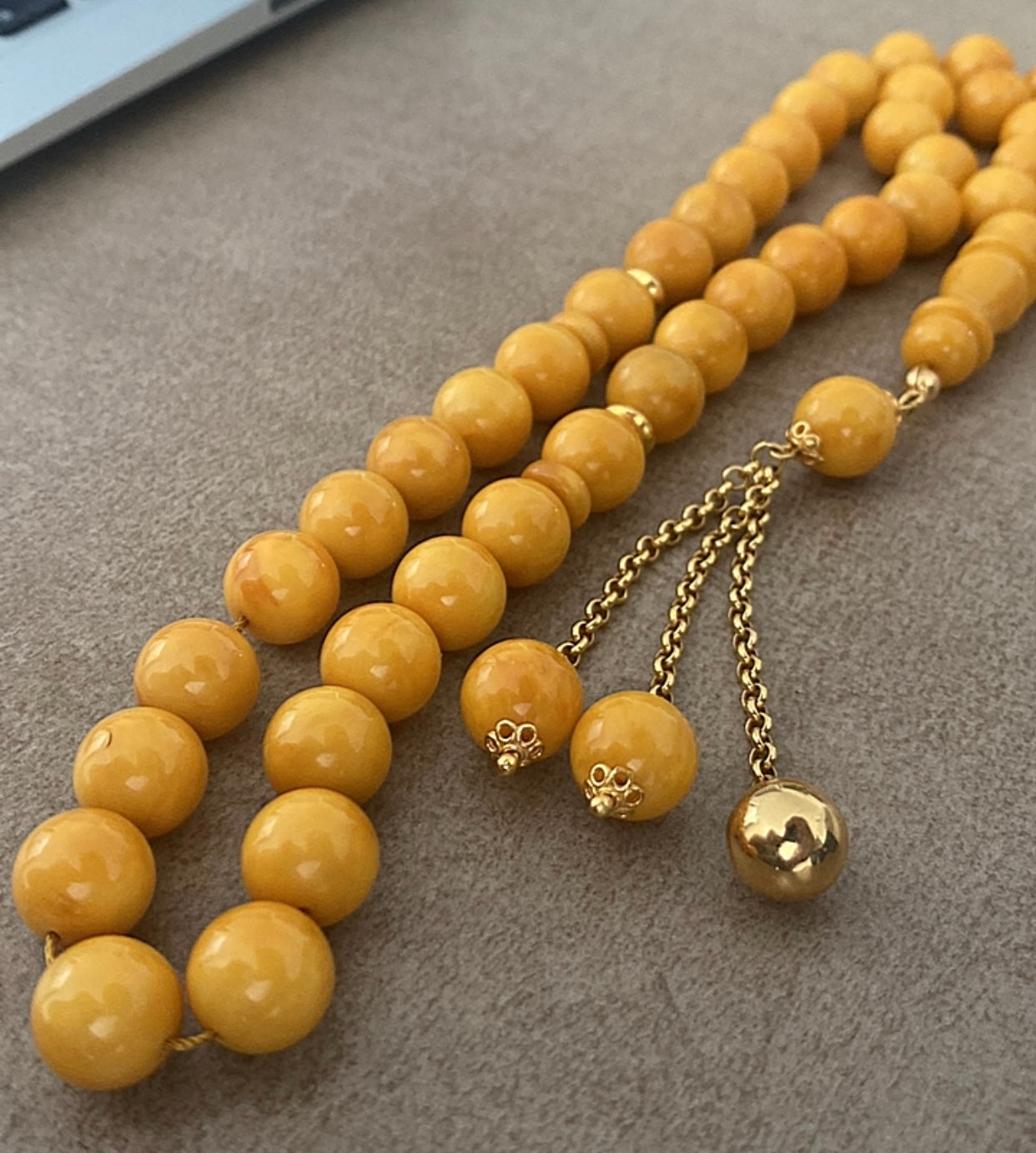 سبحة كهرب ألماني كبس - واردقطر - ذهب عيار ٢١