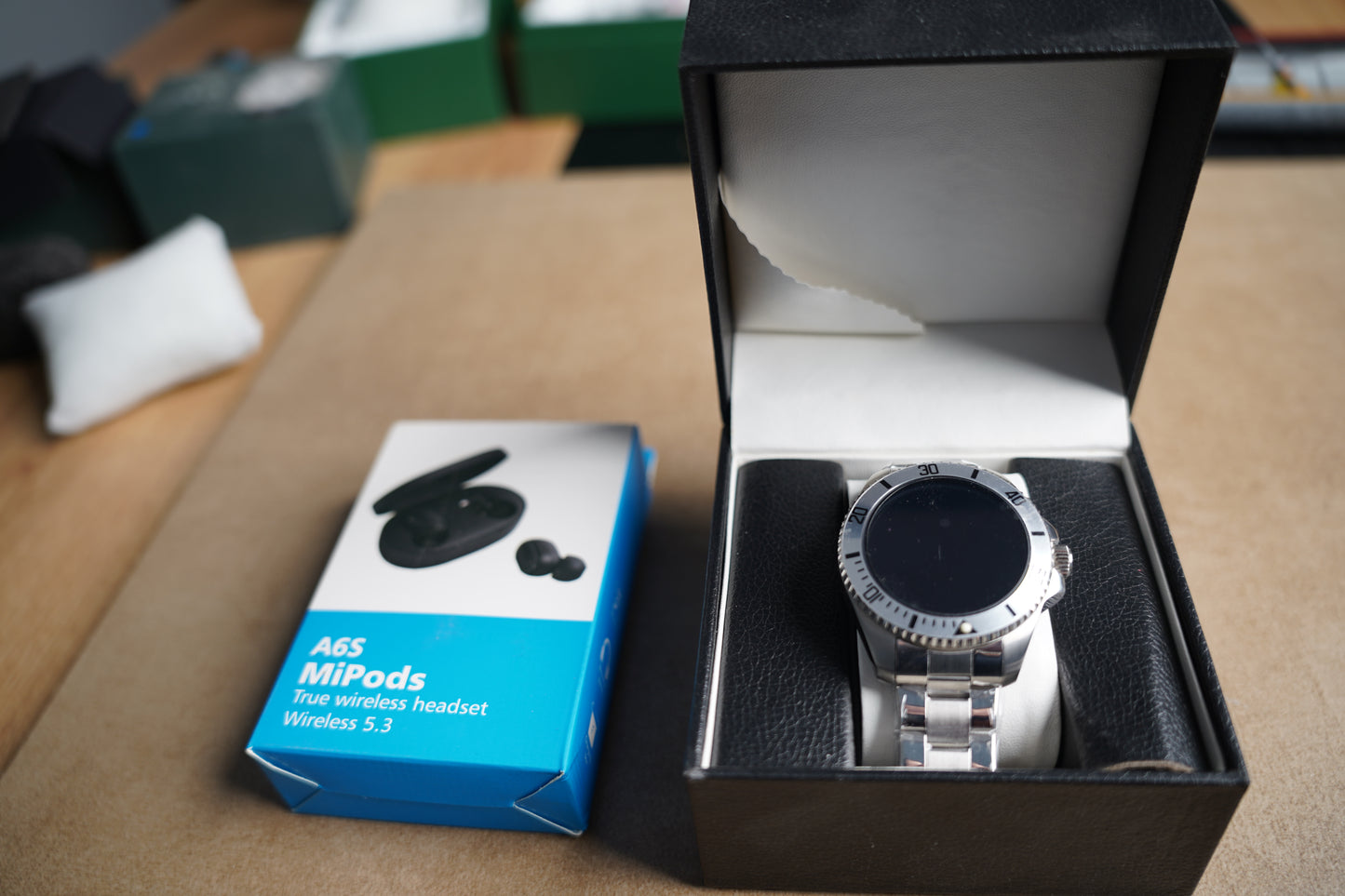 ساعه تيتانيوم الجيل الرابع + سماعات ماي بودز