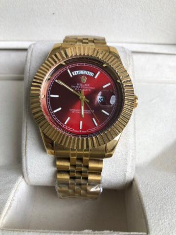ROLEX WATCH   :  ساعة رولكس داي دايت احمر