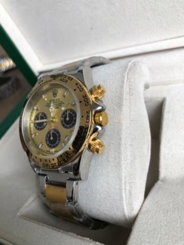ROLEX WATCH   :  ساعة رولكس دايتونا ذهبي