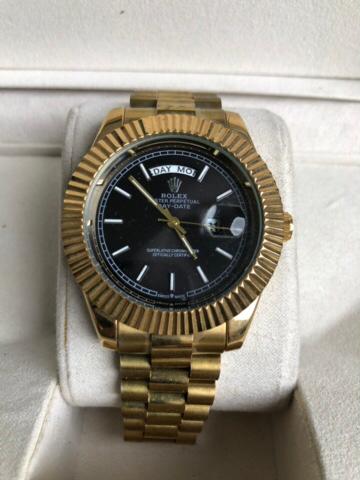 ROLEX WATCH   :  ساعة رولكس داي دايت ذهبي