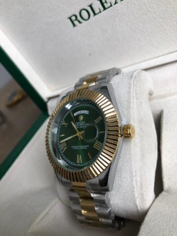 ROLEX WATCH   :  ساعة رولكس اويستر اخضر