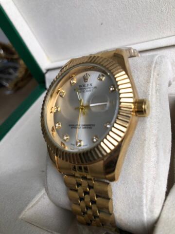 ROLEX WATCH   :  ساعة رولكس  ذهبي سلفر