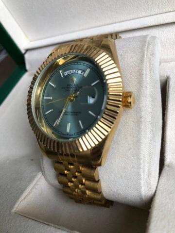 ROLEX WATCH   :  ساعة رولكس داي دايت ذهبي
