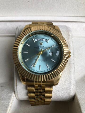 ROLEX WATCH   :  ساعة رولكس داي دايت ذهبي