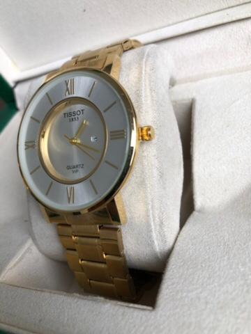 TISSOT WATCH   :  ساعة تيسوت ذهبي ابيض