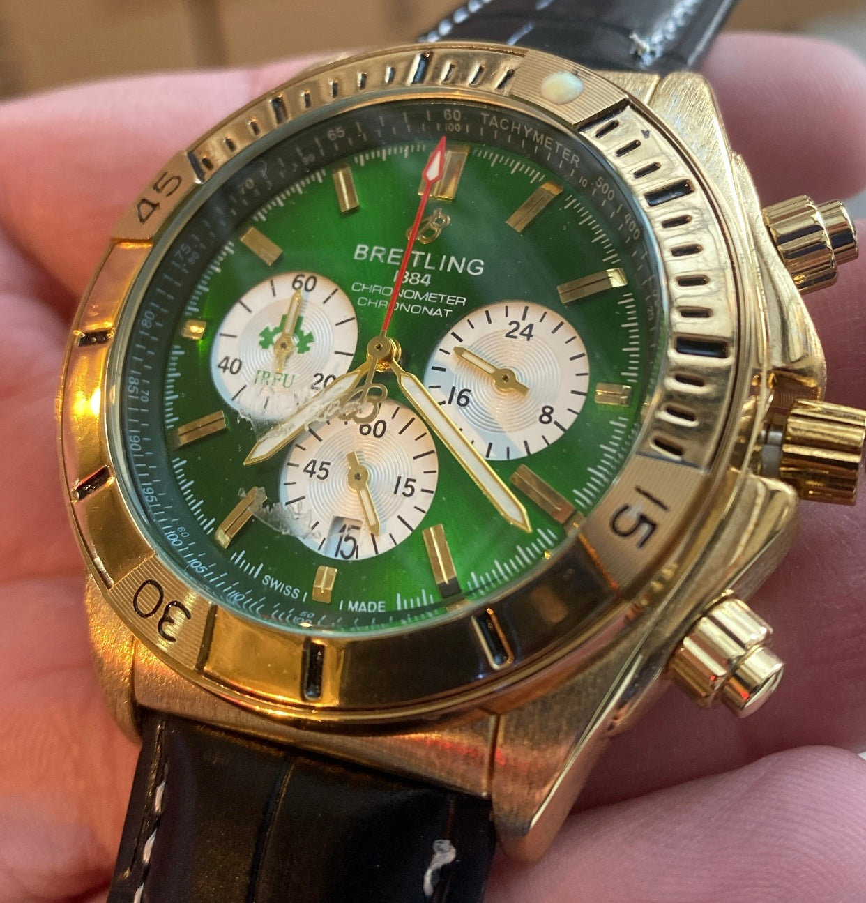 بريتلنج ذهبي و اخضر سير اسود