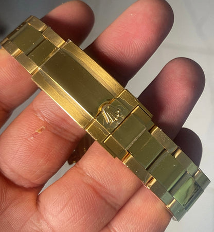 40 mm رولكس دايتونا ذهب أصفر بقرص أسود وسناتر بيضاء