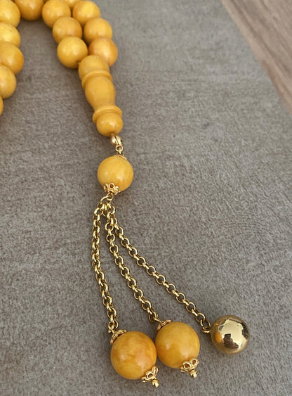 سبحة كهرب ألماني كبس - واردقطر - ذهب عيار ٢١