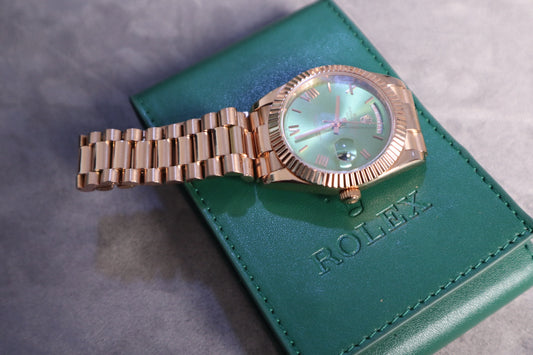 رولكس داي دايت جراند ماستر درجة اولى - روز جولد كامل مينا زيتوني (Copy)