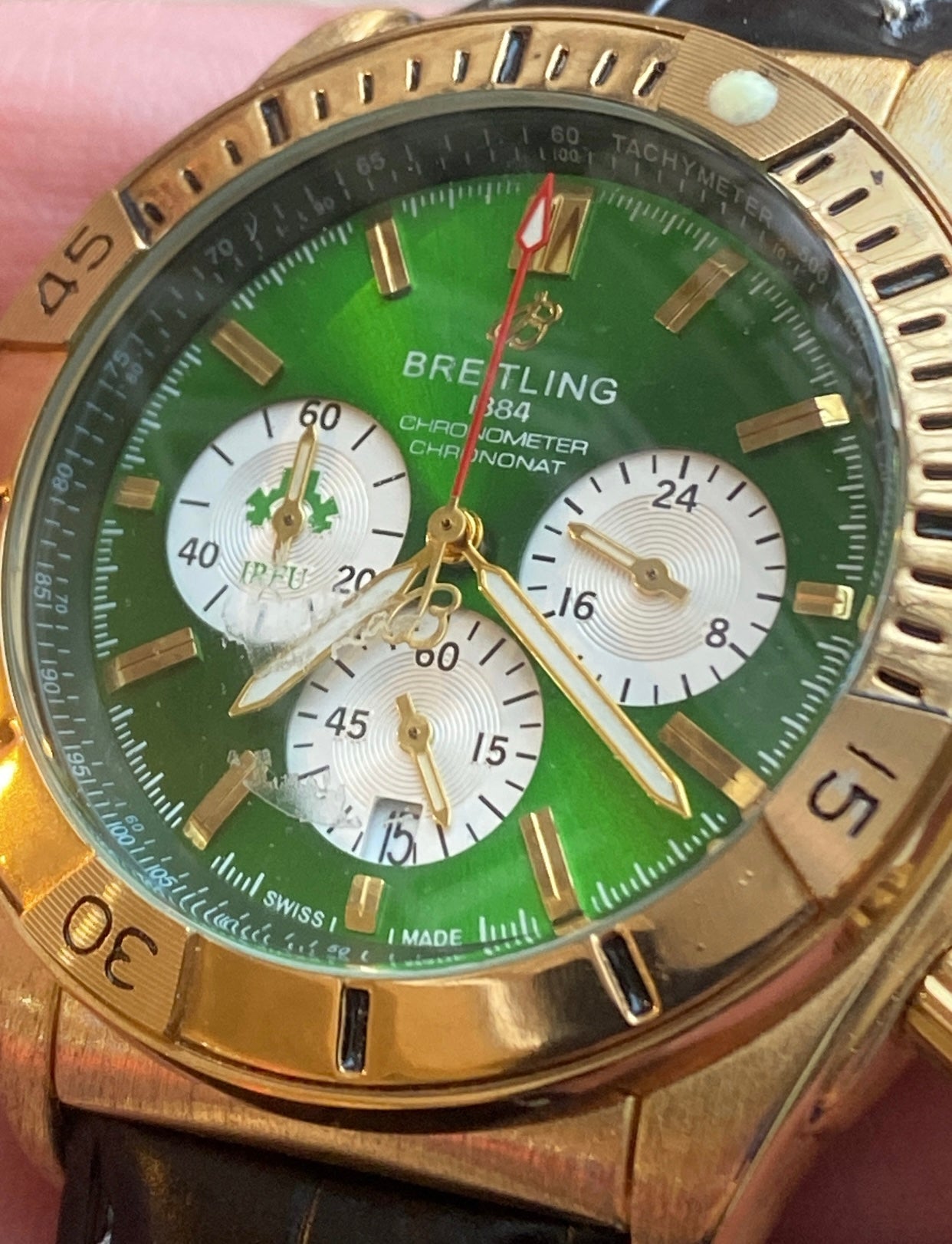 بريتلنج ذهبي و اخضر سير اسود