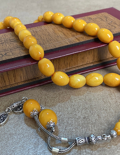 قطعة واحدة سبحة كهرب  ألماني  كبس، حجر كهرب خام طبيعي ١٠٠ بال ١٠٠ من دون اية مواد مضافه