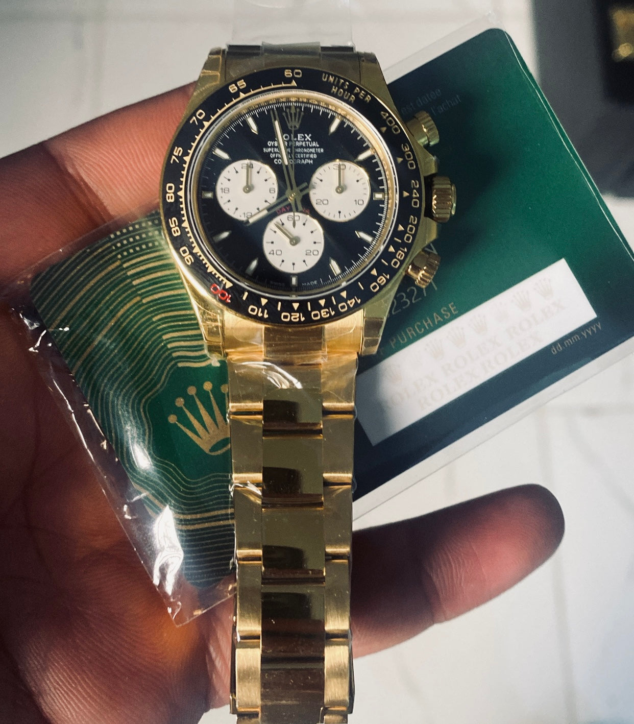40 mm رولكس دايتونا ذهب أصفر بقرص أسود وسناتر بيضاء