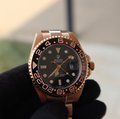(السعر بالدينار الأردني 300 دينار)Rolex GMT Master RootBeer  رولكس روت بير جراند ماستر اوتوماتيك