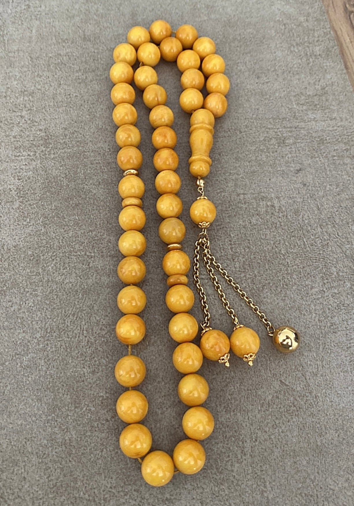 سبحة كهرب ألماني كبس - واردقطر - ذهب عيار ٢١