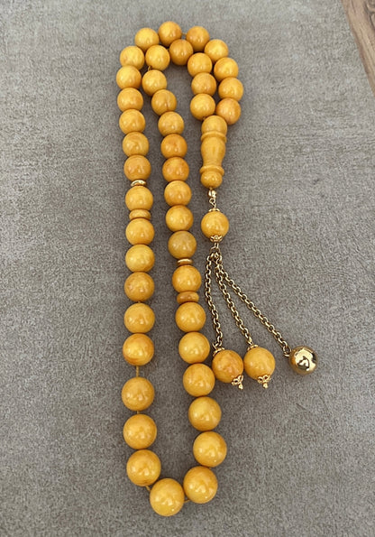 سبحة كهرب ألماني كبس - واردقطر - ذهب عيار ٢١