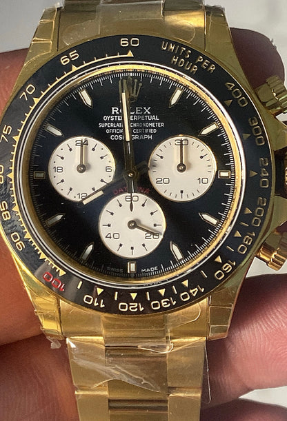 40 mm رولكس دايتونا ذهب أصفر بقرص أسود وسناتر بيضاء