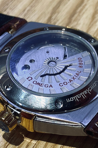 أوميجا كونستليشن ذهبي و جلد بني - كلين