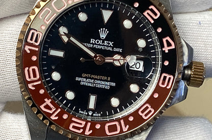 رولكس جي أم تي رووت بيير  اصدار ٢٠٢٤ جراند ماستر - مستعملة بحالة الجديد وياها حافظة جلد من رولكس