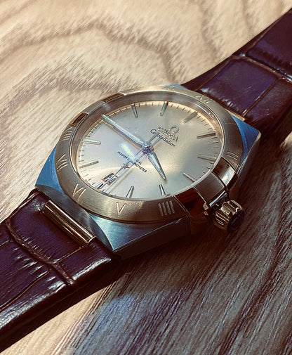 أوميجا كونستليشن ذهبي و جلد بني - كلين