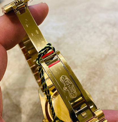 رولكس دايت ديت يالو جولد باڤيد دايال- ماكينة سويسري طبق طبق الأصل