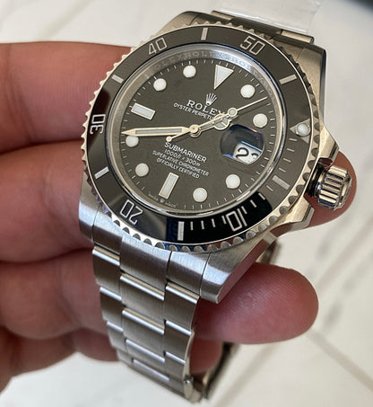 رولكس سابمارينر اسود ريفرنس جديد - كلين ماكينة سويسري و نفس المواد الخام متوفر قطععة مع كامل مرفقاتها