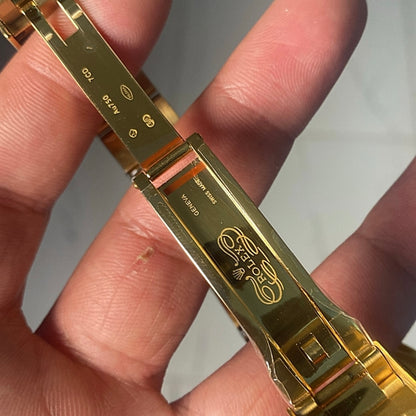 40 mm رولكس دايتونا ذهب أصفر بقرص أسود وسناتر بيضاء