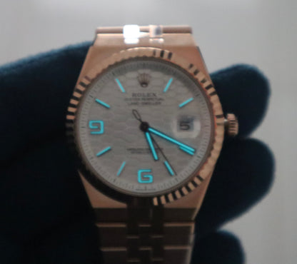 رولكس سكاي دولر ٢٠٢٥ روز جولد مينا ابض- كلين طبق الأصل