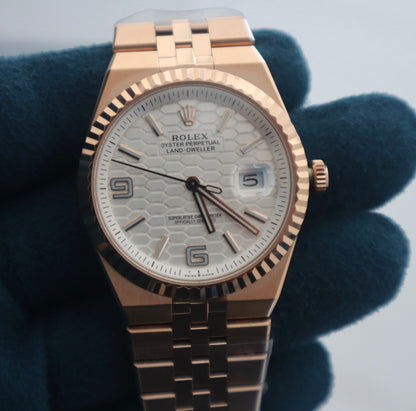 رولكس سكاي دولر ٢٠٢٥ روز جولد مينا ابض- كلين طبق الأصل