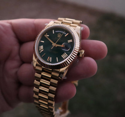 رولكس داي ديت يالو جولد ارقام روماني - الساعة كلين - مطابقة للاصلية - اللون طلاء عيار ١٨