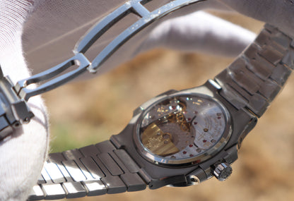 PATEK Philippe  Nautilus 5712 -  مستعملة لمدة اسبوع) - نوتيلس ستانلس كلين حبة واحدة)