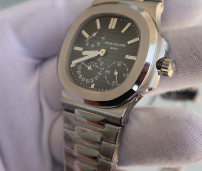 PATEK Philippe  Nautilus 5712 -  مستعملة لمدة اسبوع) - نوتيلس ستانلس كلين حبة واحدة)