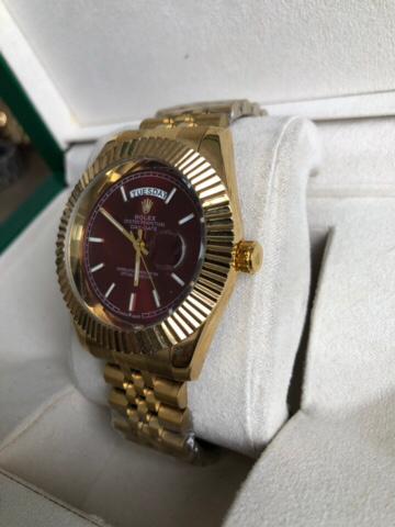 ROLEX WATCH   :  ساعة رولكس داي دايت احمر