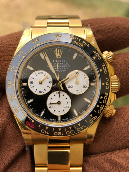 40 mm رولكس دايتونا ذهب أصفر بقرص أسود وسناتر بيضاء