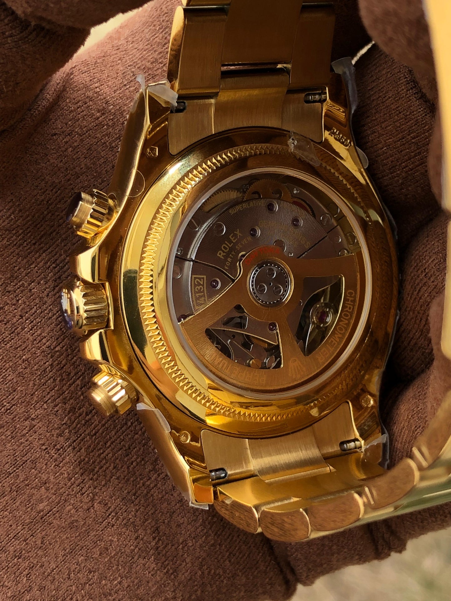 40 mm رولكس دايتونا ذهب أصفر بقرص أسود وسناتر بيضاء