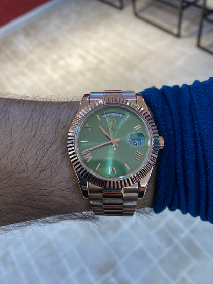 روليكس داي ديت فول روز جولد مينا زيتوني  - جراند ماستر ماكينة اوتوماتيك (قطعة واحدة)