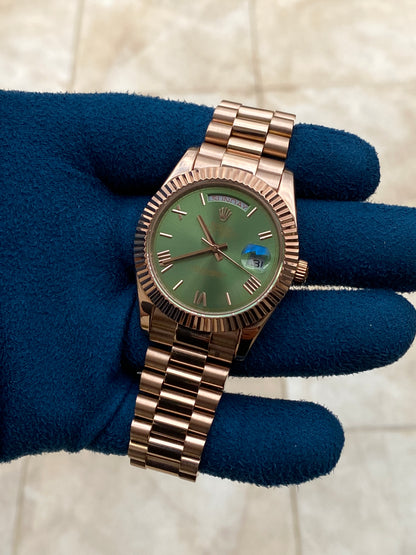 روليكس داي ديت فول روز جولد مينا زيتوني  - جراند ماستر ماكينة اوتوماتيك (قطعة واحدة)